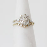 Artemer Baguette Diamond Chevron band in 18k yellow gold with the Sun Temple Ring in 18k white gold