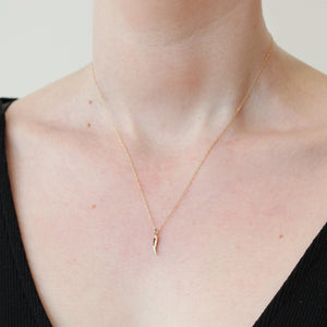 Danyell Rascoe Ruby Chili Necklace in 10k yellow gold worn on the body