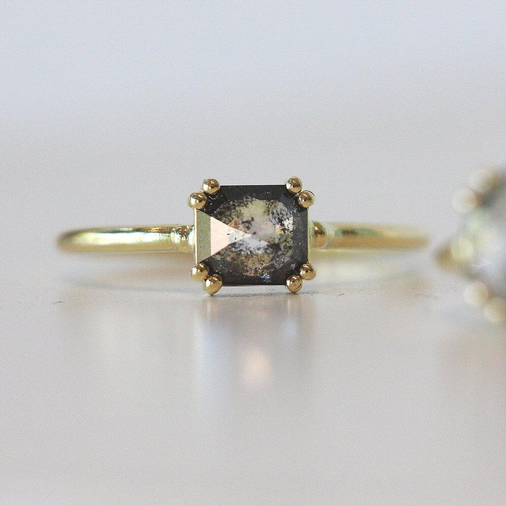 
            
                Load image into Gallery viewer, Tura Sugden Asscher Cut Salt and Pepper Diamond Solitaire Ring in 18K yellow gold
            
        